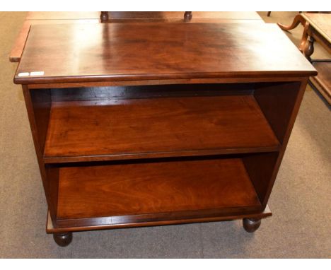A mahogany freestanding bookcase, single shelf, turned feet