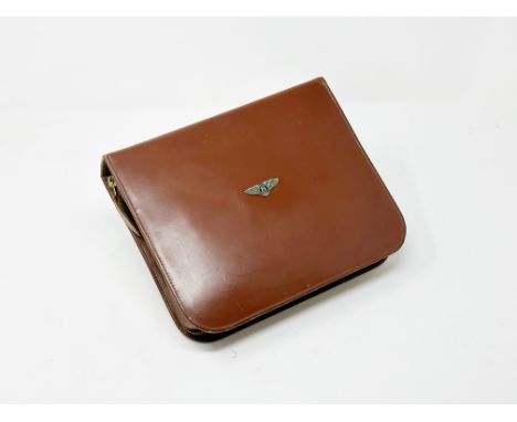 An exceptional motoring and travelling grooming case for the Vintage and Classic Bentley owner. 1930s  1950s period, zip-oper