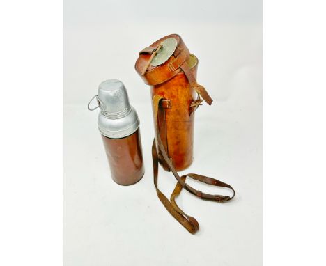 An original, 'Air-raid Precautions' wardens-issued leather-cased overnight Austin Motor Company tea and coffee flask containe