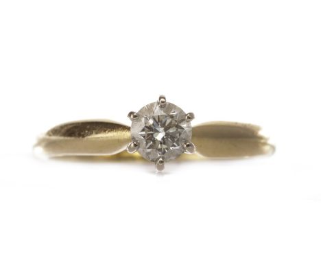 DIAMOND SOLITAIRE RING, the round brilliant cut diamond of approximately 0.33 carats, in eighteen carat gold, size K, 2.8g