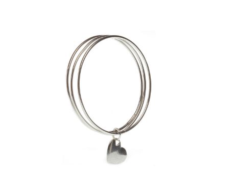 MULTI SECTION BANGLE, formed by three sections with suspended heart motif charm stamped 'Tiffany and Co 925' 66mm inner diame