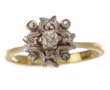 DIAMOND CLUSTER RING, the raised round brilliant cut stone of approximately 0.12 carats, surrounded by four diamond chips in 