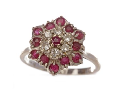 RED GEM AND DIAMOND CLUSTER RING, set with a central red gem surrounded by round brilliant cut diamonds with further red gems