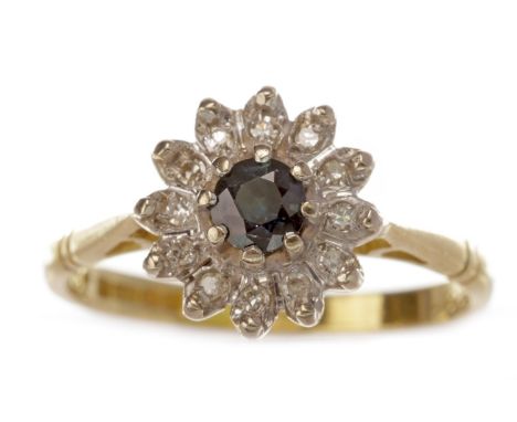 BLUE GEM AND DIAMOND CLUSTER RING, set with a round blue gem surrounded by round brilliant cut diamonds, the diamonds totalli