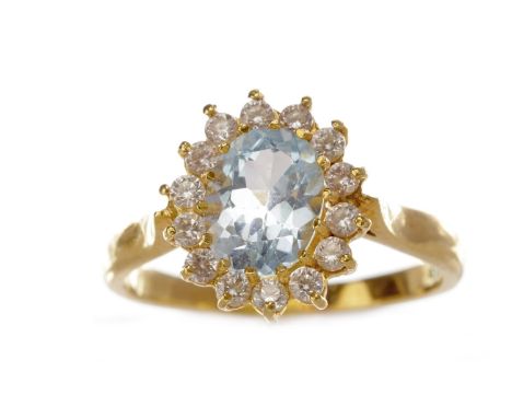 GEM SET CLUSTER RING, the oval blue stone surrounded by round white stones, marked 750 to the shank, size R, 4.5g