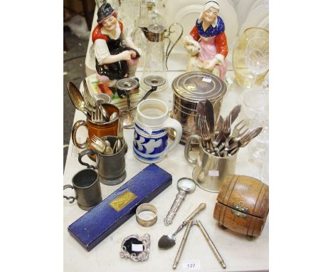 An early 20th century silver plated ice bucket; a white metal hafted magnifying glass; an Art Nouveau white metal miniature p