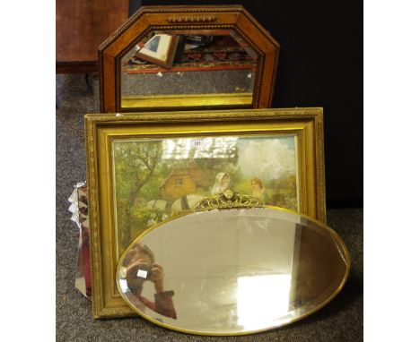 An early 20th century oak canted rectangular mirror; a Victorian tinted lithograph print, period gesso frame; mirrors; prints