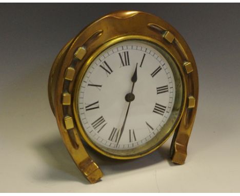 A 19th century brass horseshoe mantel clock