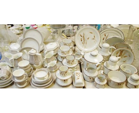 A Midwinter Wild Oats pattern part dinner and tea service including meat plate; tureen; serving dishes; soup bowls; teapots; 
