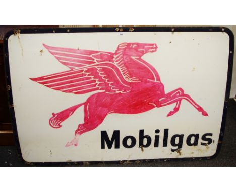 A Mobilgas enamel sign. 