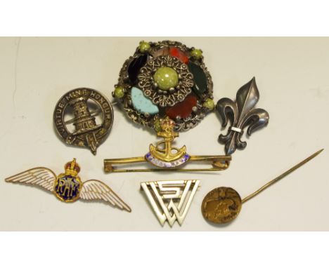 A Scottish silver Highland bonnet badge, in relief with the crest and motto of Clan Maclean; a hardstone brooch; an enamel RA