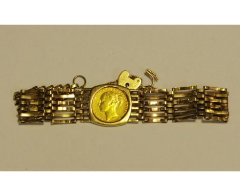 A Victorian sovereign set gate bracelet, 1871, 9ct gold seven bar gate bracelet, padlock clasp, 23.4g gross.  