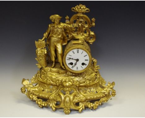An Ormulu grape/farmer boy Mantel clock, enamel dial, Roman numerals. 
