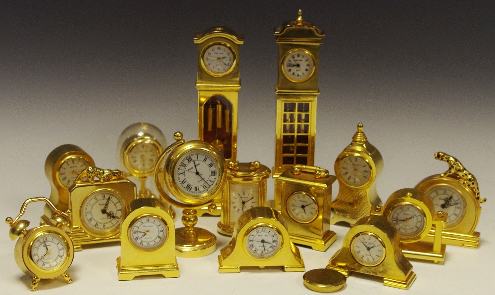 Miniature Clock various brass clocks in different styles, including a