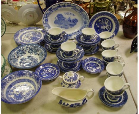 Blue and White including Stoke potteries Delph meat plate, old willow ironstone tea cups, saucers, plates, etc. 