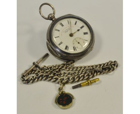 An Edwardian J G Graves open face pocket watch, Chester 1904, suspended from,a graduated silver Albert chain, bloodstone and 