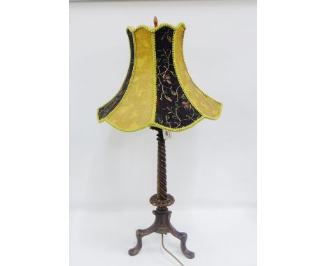 Table lamp base and shade on tripod supports 