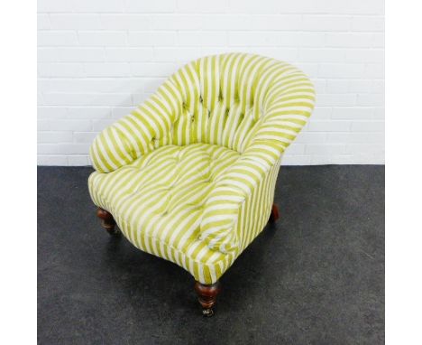Striped upholstered button back chair on mahogany supports with brass caps and castors,  70 x 70cm