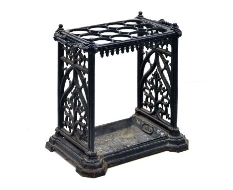 Late Victorian cast iron umbrella or stick stand, the rectangular frame with three rows of four divisions, the sides with twi