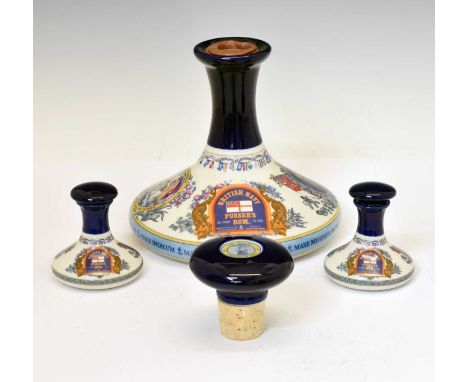 Pusser's British Navy Rum in a Wade ceramic ships decanter commemorating Lord Nelson, 1 litre, together with two empty miniat