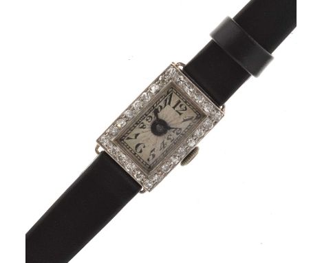 Lady's Art Deco white gold stamped 'Platinum' cocktail watch, the silvered guilloche dial with black Arabic hour markers and 