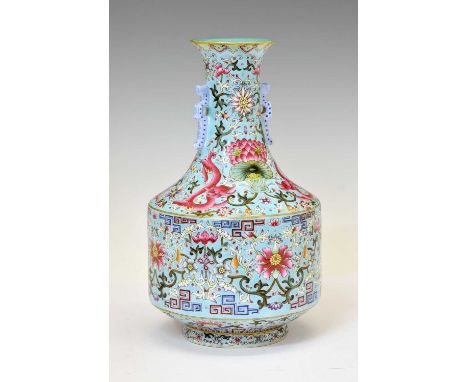 Chinese Canton Famille Rose porcelain vase, of mallet form with side handles, finely enamelled with lotus, lilies and pink dr
