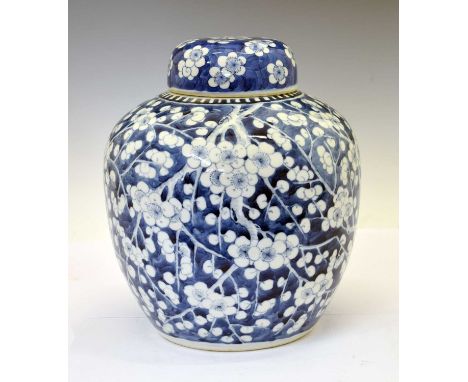 Chinese blue and white porcelain ginger jar and cover, probably Qing dynasty, late 19th century, decorated with prunus blosso