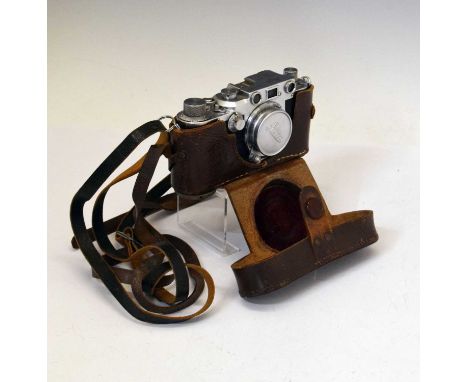 Leica D.R.P. Ernst Leitz Wetzlar camera, no. 415376, with Leitz Elmar f=5cm 1:35 lens, with cap, and Leica brown leather case