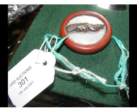 A Japanese Kagamibuta Netsuke - signed 