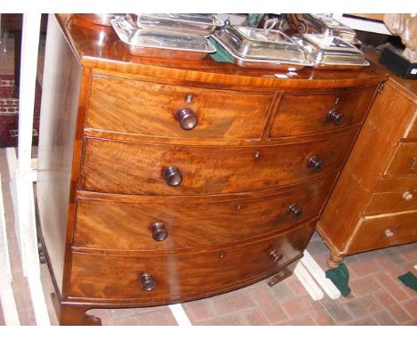 An early 19th century mahogany bow fronted chest of two short and three long drawers - width 110cms 