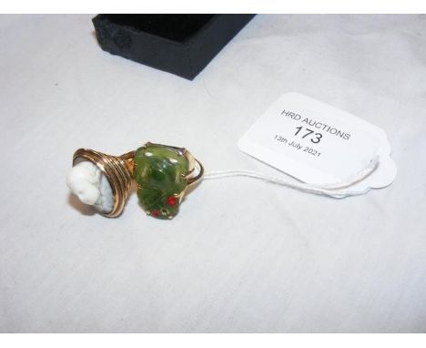 A yellow metal ring set with jade, together with a yellow metal ring set with cameoCONDITION REPORTJade ring - size L 1/2Came