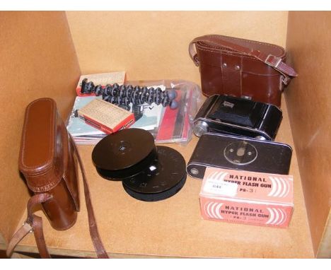 A folding camera together with othersCONDITION REPORTThere are a further two cameras in the two cases:An Agfa 'Isolette' and 