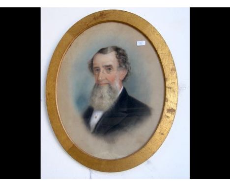 A framed and glazed oval pastel portrait - signed GEORGE HALL 1874 