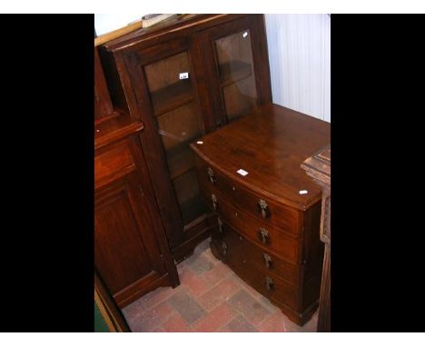 An antique glazed bookcase together with a converted commode chest