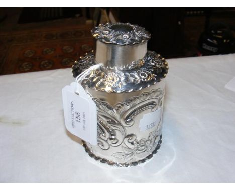 An embossed silver tea caddy, Birmingham 1918 - approx. weight 3.4 troy ouncesCONDITION REPORTBy our judgement, condition of 