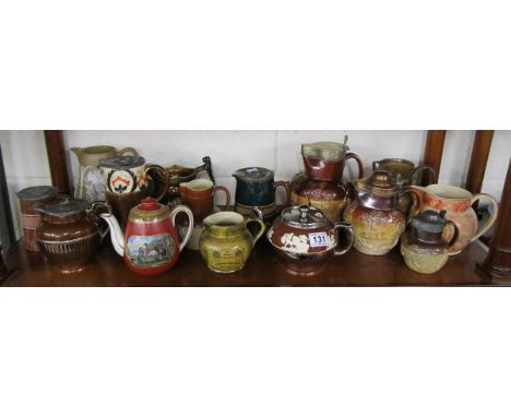 Shelf of jugs and teapots