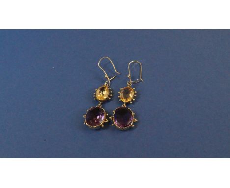 A pair of vintage citrine and amethyst drop earrings.