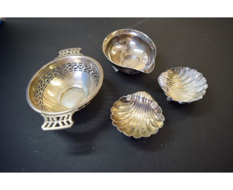 A pair of silver shell salts; together with a pierced silver bonbon dish; and a toddy ladle bowl.