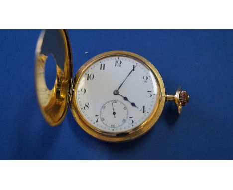 An 18ct gold half hunter pocket watch, the unsigned 4cm white enamel dial with Arabic numerals and subsidiary seconds dial, w