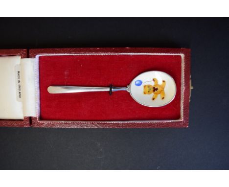 A boxed silver child's spoon, by W W C & S, Birmingham 1973, having coloured enamel bowl decorated Teddy bear with balloon.