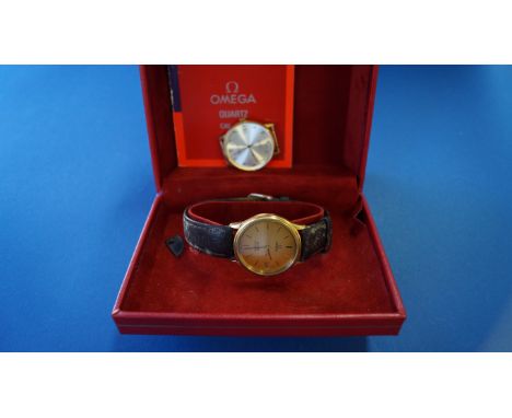 A cased vintage Omega De Ville gentleman's quartz wristwatch, on leather strap, cal 1332, with instruction booklet; together 