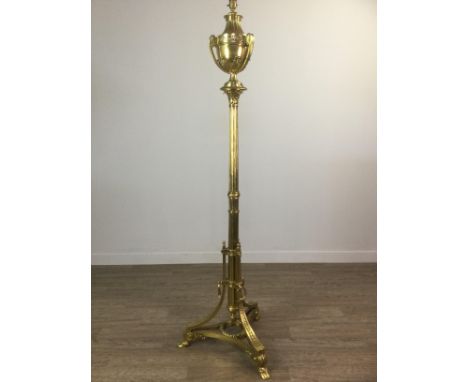 AN EARLY 20TH CENTURY BRASS FLOOR LAMP, of Neo Classical design, with urn-shaped sconce over a fluted column and concave trip