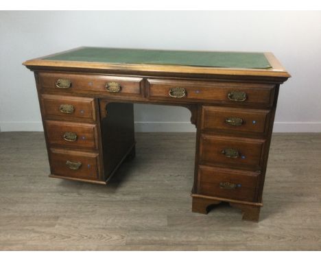 LATE 19TH CENTURY MAHOGANY KNEEHOLE DESK, the moulded oblong top inset green rexine writing surface, over two frieze and thre