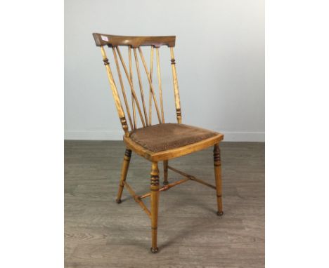 ARTS &amp; CRAFTS OAK STICK BACK SIDE CHAIR, with curved backrest and on turned tapered legs joined with an H-stretcher