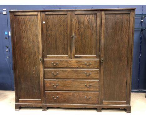 MAHOGANY PRINCESS WARDROBE, fitted with four doors and drawers, on bracket feet, 220cm wide Provenance: A Private Scottish Co