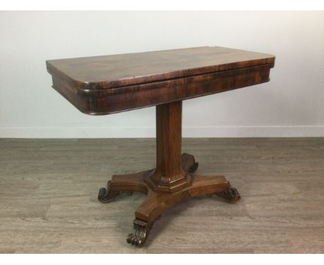 VICTORIAN ROSEWOOD TURNOVER CARD TABLE, the oblong top with rounded corners, on an octagonal column support on a concave quat