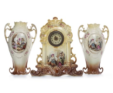 LATE VICTORIAN CERAMIC CLOCK GARNITUREthe cream enamel dial with Arabic numerals, the architectural case transfer decorated w