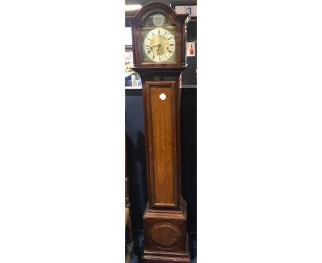 MINIATURE CHIMING LONGCASE CLOCKthe arch moulded hood enclosing an arched brass and silverised dial with Roman and Arabic num