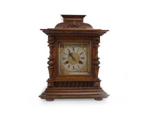VICTORIAN MANTEL CLOCKthe two train movement by Junghans, the gilt dial with silvered, Roman numeral chapter ring, the mahoga