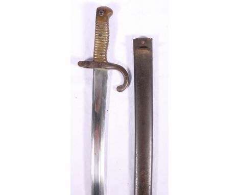 French model 66 sword bayonet with yataghan blade marked to edge St Etienne Avril 1871, brass hilt and scabbard matching numb